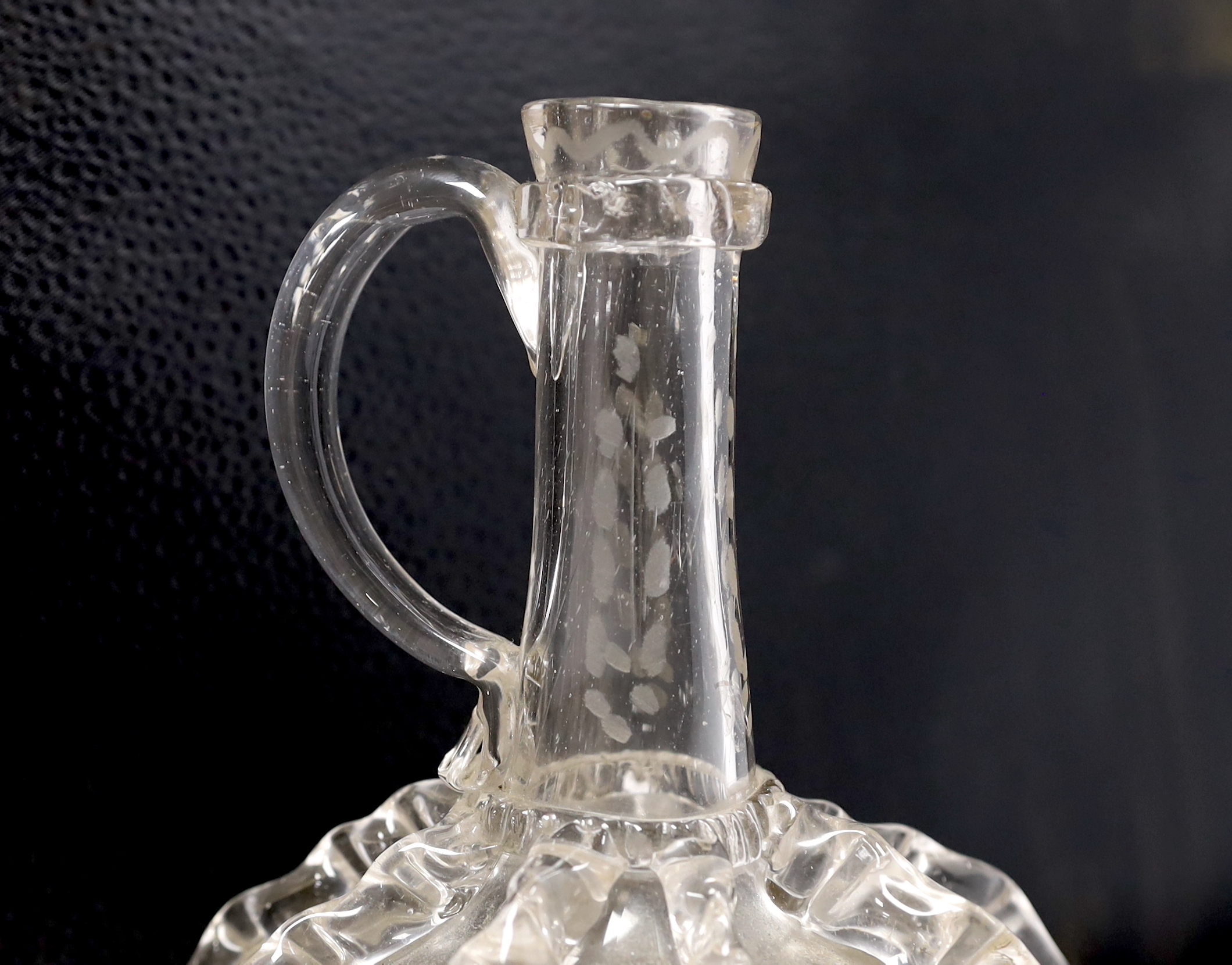 An 18th century Dutch engraved glass decanter, 24cm high